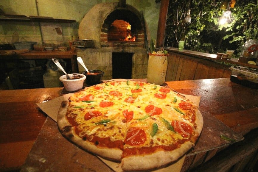 Unique pizza at Roots Pizza a Leña restaurant in Holbox