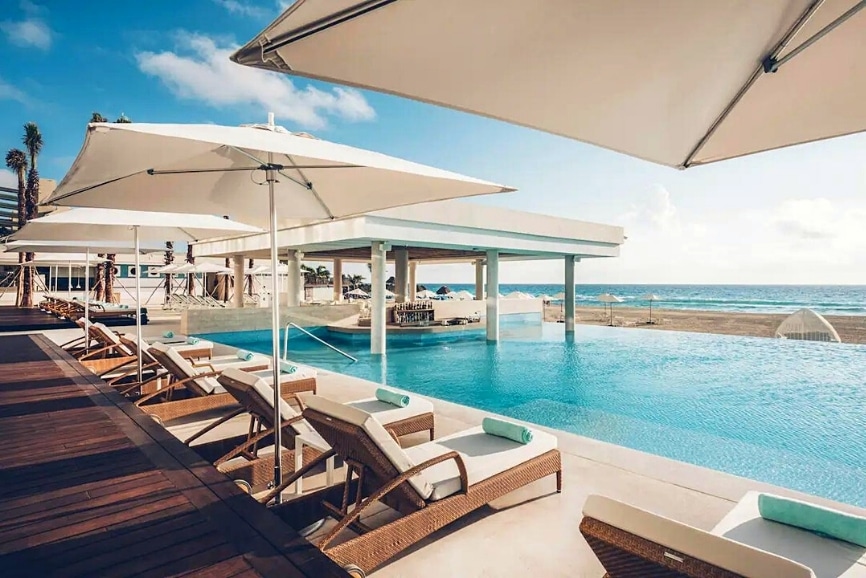 Lounge at the pool at Coral Level at Iberostar Selection in Cancun