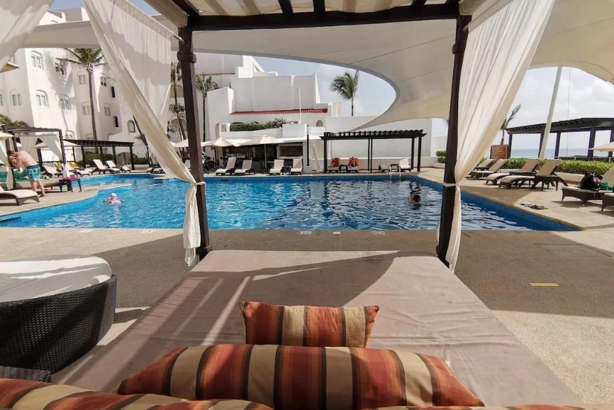 Lounge by the pool at GR Caribe by Solaris in Cancun