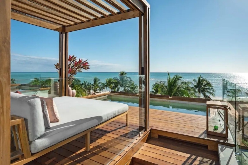 Lounge by the pool at the Rosewood Mayakoba in Playa del Carmen