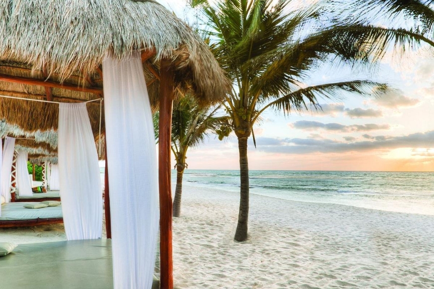 Beach cabanas at El Dorado Casitas Royale in Puerto Morelos