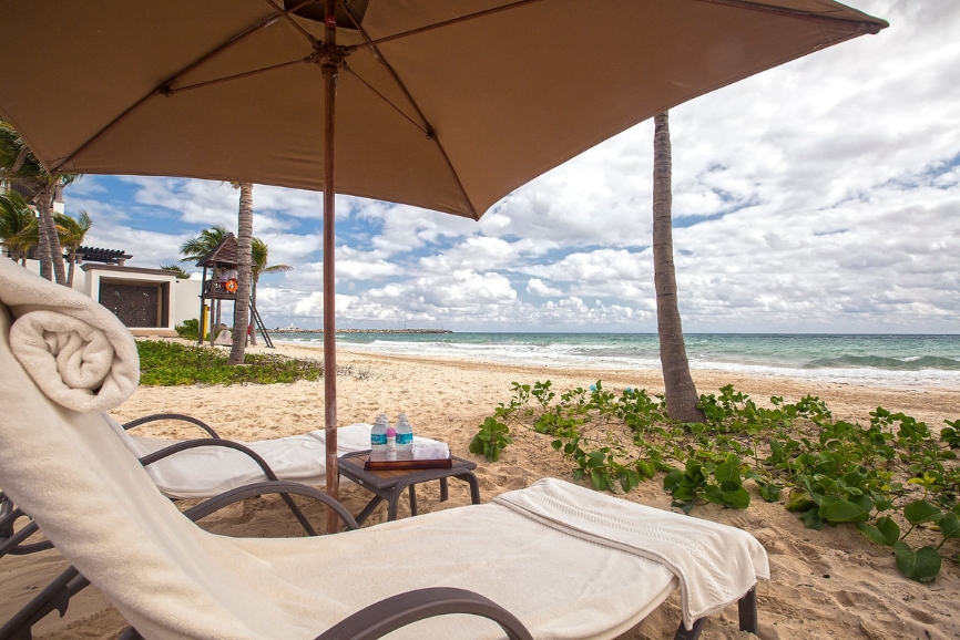 Lounge by the beach at Grand Residences Riviera Cancun