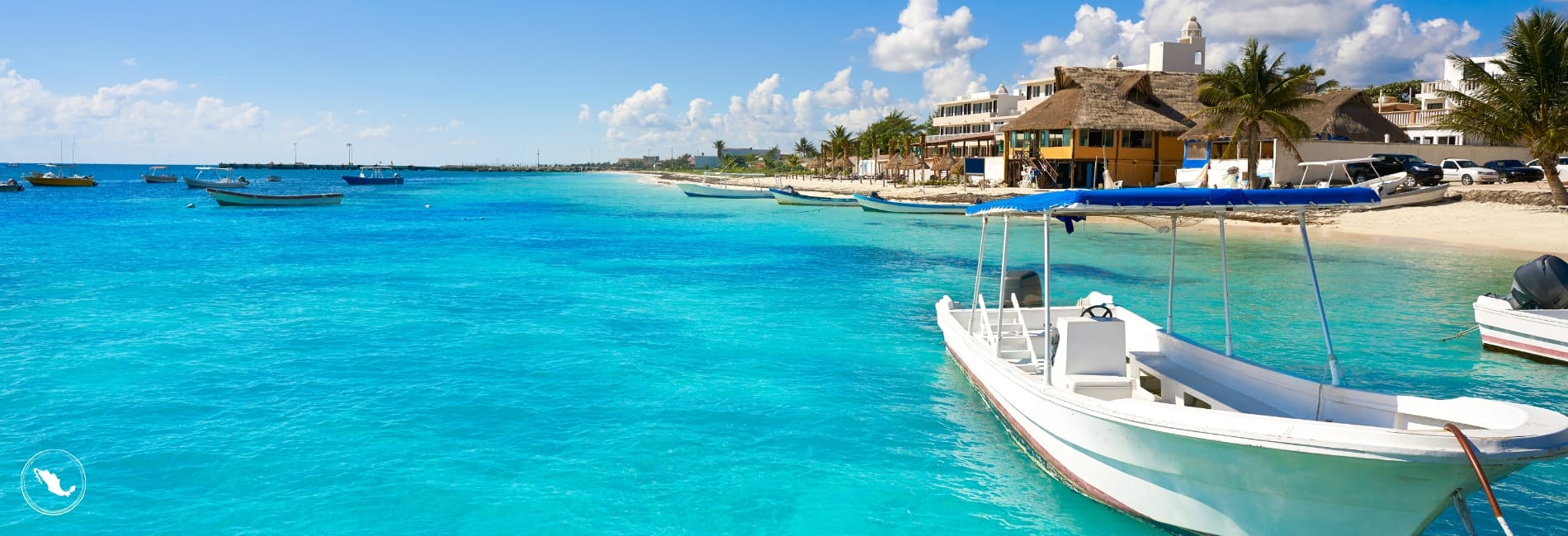 Boat on turquoise water of the Riviera Maya in Mexico