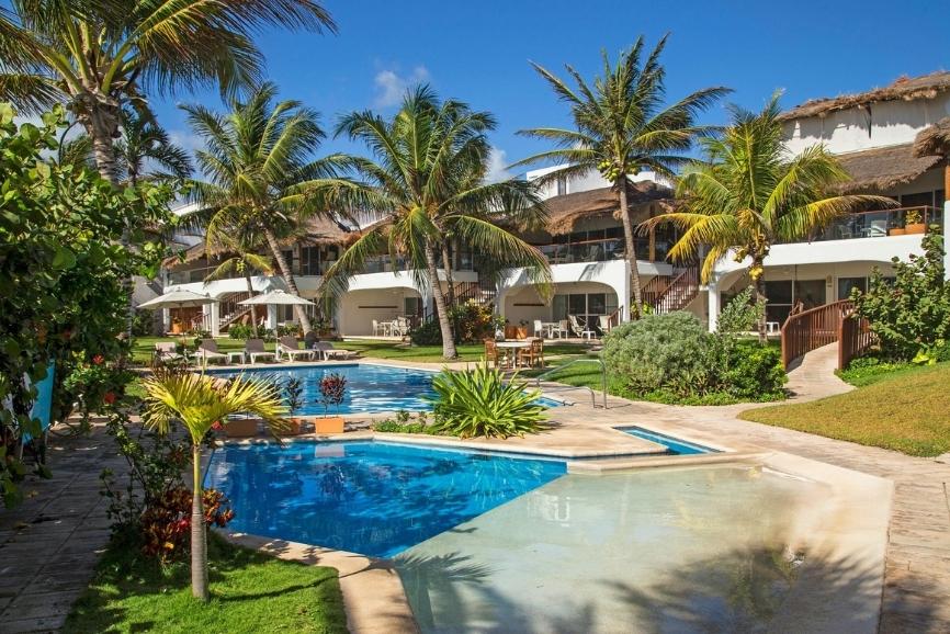 Swimming pool and outdoor space at Las Villas Akumal