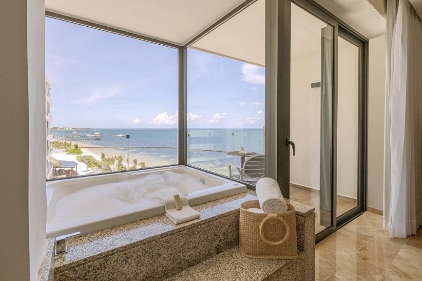 Bath tub with a view at Sensira Resort and Spa Riviera Maya in Puerto Morelos