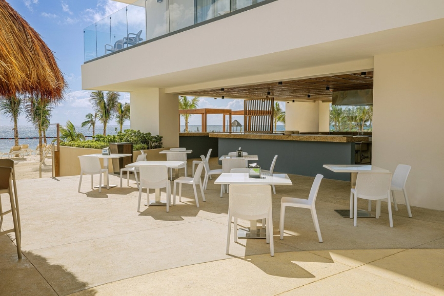 Outdoor dining at Sensira Resort and Spa Riviera Maya in Puerto Morelos