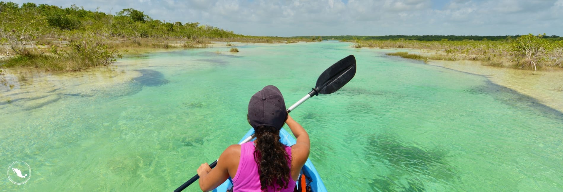 Kayaking at the Lake of 7 Colors in Bacalar Mexico