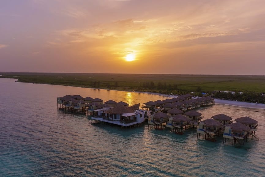 Sunset views at Palafitos Overwater Bungalows at El Dorado Maroma in Playa del Carmen