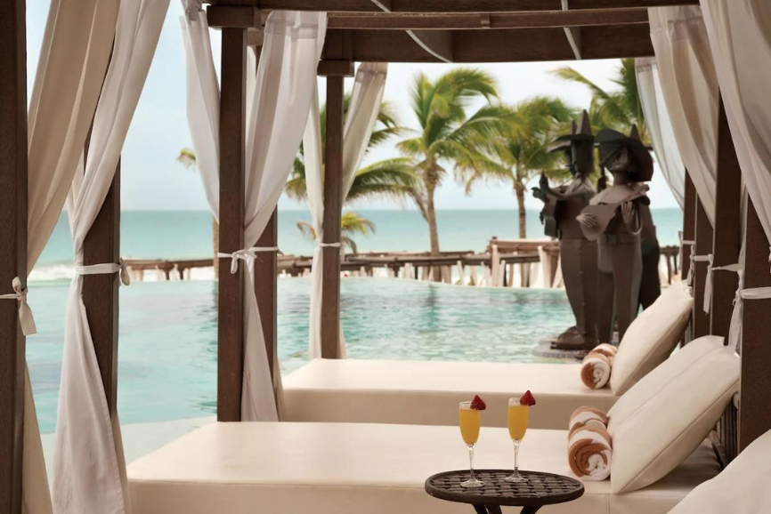 Poolside cabanas at the Hyatt Zilara Cancun Resort