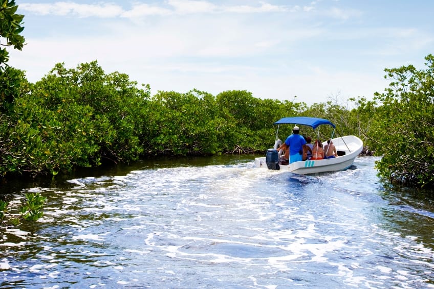 Boat on the water at Sian Ka'an Nature Biosphere Reserve in Riviera Maya Mexico