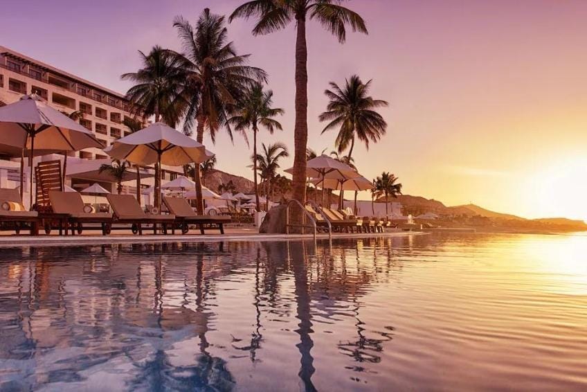 Sunset pool views at Marquis Los Cabos