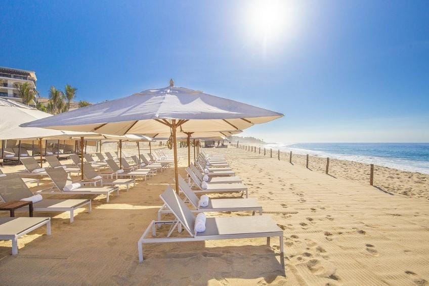 Beach lounge chairs at Villa La Valencia Beach Resort and Spa Los Cabos