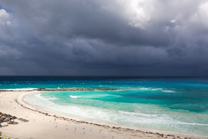 Storm clouds over a Cancun beach